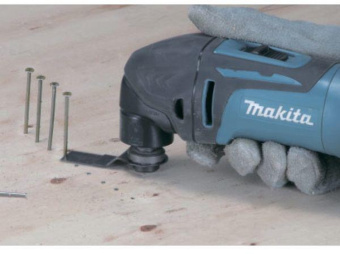 Многофункциональный инструмент Makita DTM50Z синий - купить недорого с доставкой в интернет-магазине