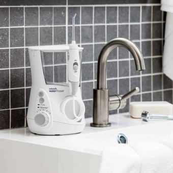 Ирригатор Waterpik WP-660ЕU импульсн. 7насад. белый - купить недорого с доставкой в интернет-магазине