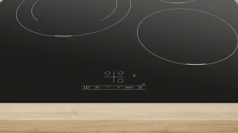 Индукционная варочная поверхность Bosch PUJ611BB5E черный - купить недорого с доставкой в интернет-магазине