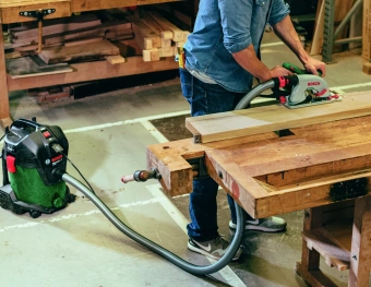 Строительный пылесос Bosch UniversalVac15 1000Вт (уборка: сухая/влажная) зеленый - купить недорого с доставкой в интернет-магазине