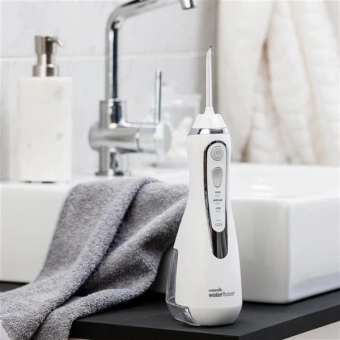 Ирригатор Waterpik WP-560ЕU портатив. импульсн. 4насад. белый - купить недорого с доставкой в интернет-магазине