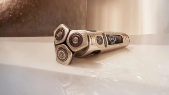 Бритва роторная Philips SP9883/36 реж.эл.:3 питан.:аккум. золотистый/черный - купить недорого с доставкой в интернет-магазине