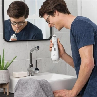 Ирригатор Waterpik WP-560ЕU портатив. импульсн. 4насад. белый - купить недорого с доставкой в интернет-магазине
