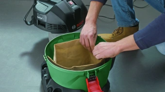 Строительный пылесос Bosch UniversalVac15 1000Вт (уборка: сухая/влажная) зеленый - купить недорого с доставкой в интернет-магазине