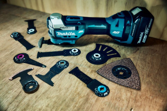 Многофункциональный инструмент Makita DTM52Z синий/черный - купить недорого с доставкой в интернет-магазине
