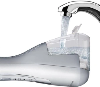 Ирригатор Waterpik WP-560ЕU портатив. импульсн. 4насад. белый - купить недорого с доставкой в интернет-магазине