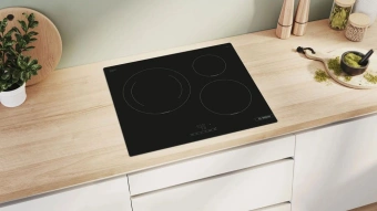 Индукционная варочная поверхность Bosch PUJ611BB5E черный - купить недорого с доставкой в интернет-магазине