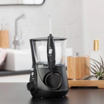 Ирригатор Waterpik WF-662 7насад. черный - купить недорого с доставкой в интернет-магазине