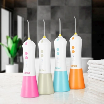 Ирригатор Kitfort КТ-2958-2 портатив. 4насад. зеленый/белый - купить недорого с доставкой в интернет-магазине